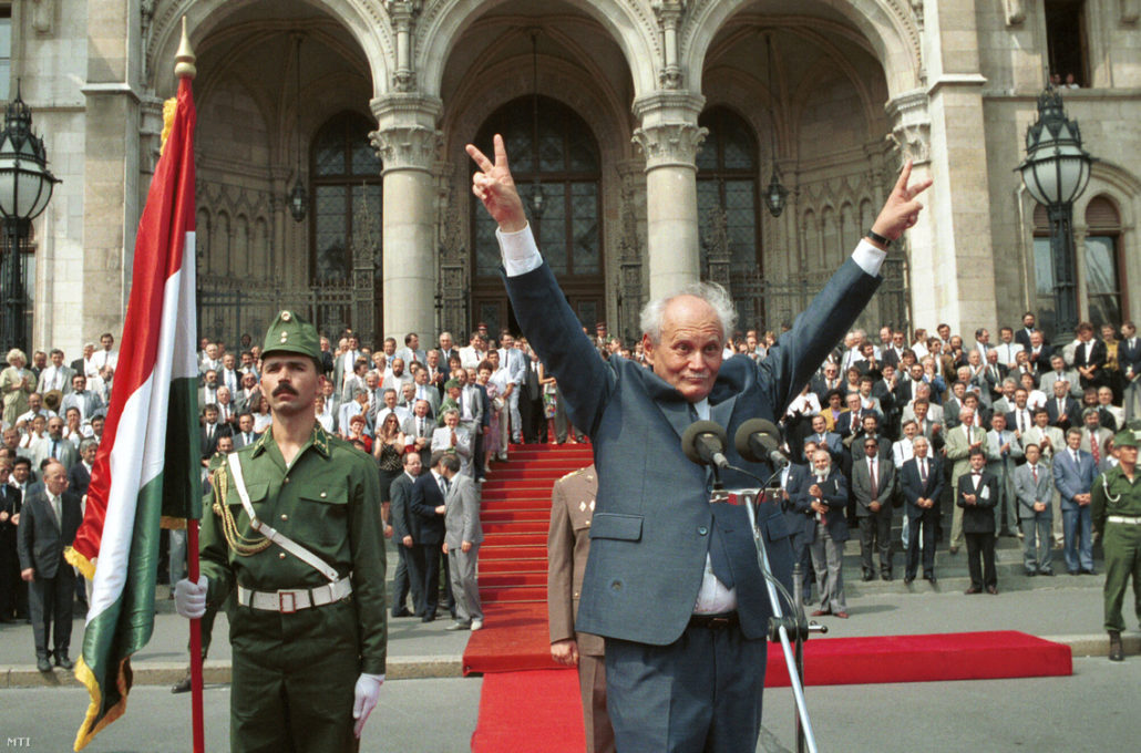 Newly elected President Árpád Göncz greeting the crowd in front of the Hungarian Parliament in 1990. Göncz was imprisoned in 1957 for his participation in the 1956 revolutionPhoto by Csilla Cseke, MTI